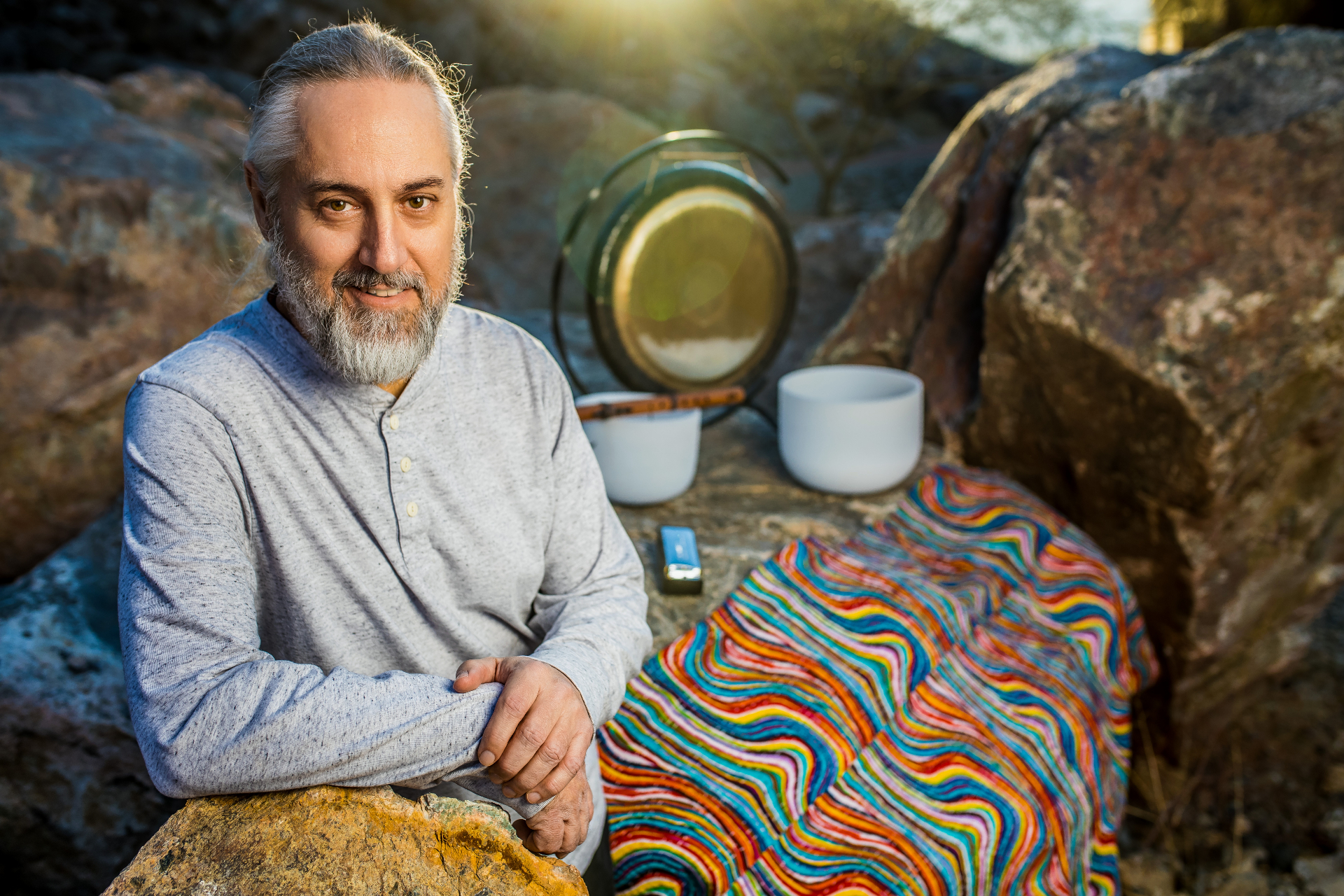 Stuart Preston with singing bowls and gong